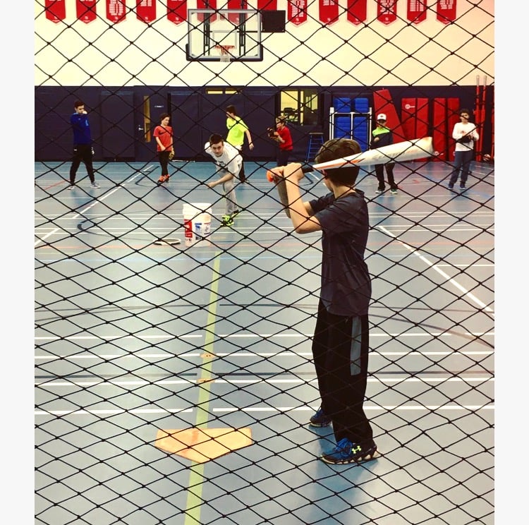 Children hitting baseball home runs at our Toronto sports programs